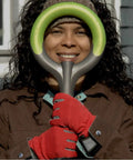 Woman holding 202 Pro Ergonomic Stainless Steel Shovel With Round Point Blade For Clay And Rocky Soil in Original Green handle.