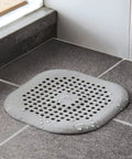 Two Pack Hair Catcher Drain Stopper for Shower and Tub with Suction Cups on Tile Floor
