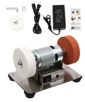 Compact Mini Bench Grinder With An All Brass Brushless Motor And Rock Solid Steel Frame, showcasing polishing wheels and AC adapter.