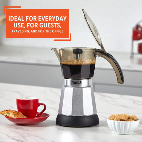 Heavy Duty Cast Aluminum Electric Espresso Maker Brews Three Or Six Cups Slick Silver Design with coffee and cookies.
