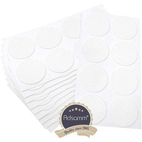 Real Deal Self Adhesive Felt Pads For All Furniture Legs To Save Your Floors From Scuffs With A Big Time Grip That Keeps Things Locked Down 80 Pack of 2 inch round white glides on sheets.