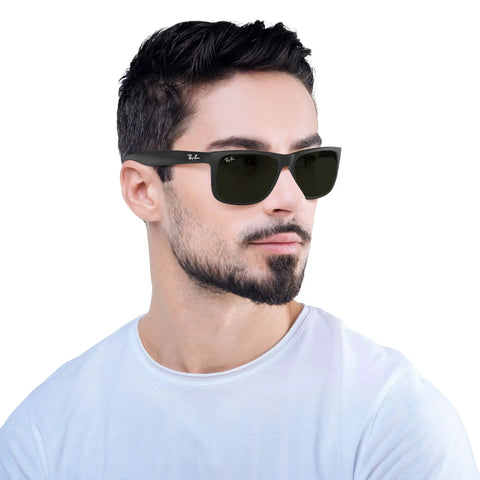 Person wearing RB4165 Justin Classic Square Sunglasses 55mm Black Nylon Frames with Green Classic Lenses Unisex Shades