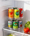 Two Pack Two Tier Clear Acrylic Lazy Susan Turntable Organizer with soda cans in fridge for efficient storage