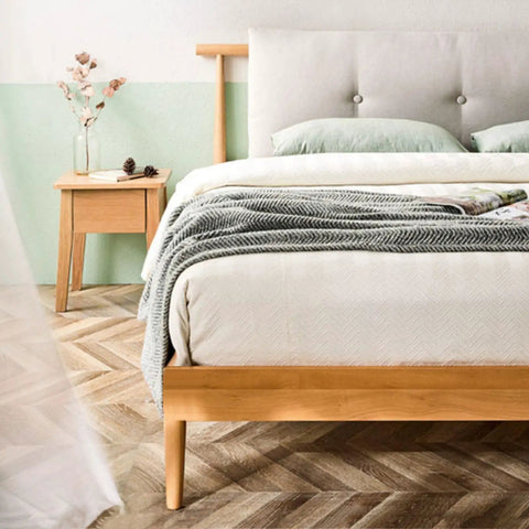 Bedroom setup with bedframe supported by Solid Oak Tapered Sofa Legs Set Of 4 With M10 Bolt Replacement For Couch Chair Dresser Cabinet