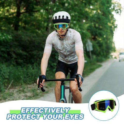 Cyclist wearing OTG Ski Goggles For Over Glasses With Anti Fog Lenses, Colorful Lenses And Fluorescent Frames, on a road.