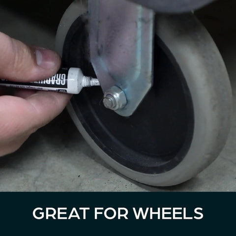 Graphite Lock Lubricant With Precision Needle Applicator used on metal wheel mechanism for smooth operation