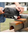 Heavy Duty 600W Electric Belt Sander With Variable Speed Control in use on timber surface for smooth woodworking.