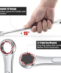 Hand holding Combo Wrench Set 33 Piece Chrome Vanadium Steel Wrenches 12 Point SAE And Metric; close-up of wrench design details.