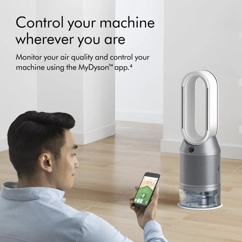 Man uses smartphone app to control Dope All In One Air Purifier Humidifier And Cooler For A Healthier Home with HEPA H13 filter.