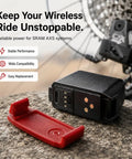 Beefed Up 500mAh Replacement Battery For SRAM eTap And eTap AXS Longer Ride Time with USB-C port and red cover on stone surface.