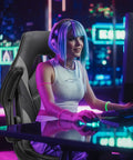Gamer seated in an Ergonomic Gaming Desk Chair With PU Leather Upholstery, ideal for home and office use.