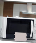 Microwave Waveguide Cover Replacement with high temperature resistant mica sheet displayed in front of a microwave oven