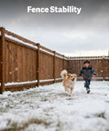 Wooden fence stability in snowy backyard with a child and a dog running, illustrating durable outdoor construction.