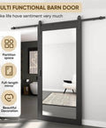 36 Inch Wide By 84 Inch Tall Mirror Barn Door Built Tough With 6.6 Foot Sliding Hardware Kit Included One Lite Full Length Glass Solid Wood Waterproof PVC Surface Scratch Resistant No Assembly Required Black installed in room
