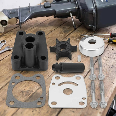Industrial Water Pump Repair Kit With Impeller Assembly For Marine Outboard Motors 2 Stroke 4 Kilowatts Includes Replacement Components To Refresh Cooling System And Keep Your Marina Workshop On Point. Outboard motor water pump parts kit on wooden bench