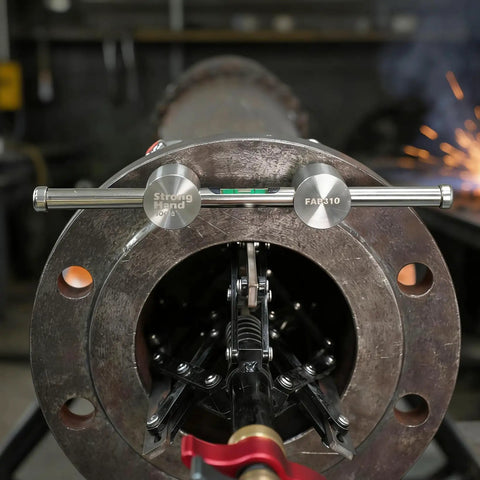 SUS304 Heavy Duty Stainless Steel Two Hole Pin With Push Button Quick Lock For Pipe Alignment And Rigging Work, shown in use.