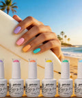 Beach scene with Six Candy Colors Gel Nail Polish Set HEMA Free TPO Free Soak Off Gel Polish Kit 15ml UV LED on nails and bottles.
