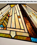 Close-up of Tiffany Style Stained Glass Pendant Light Fixture showcasing intricate mission antique design with warm glow.