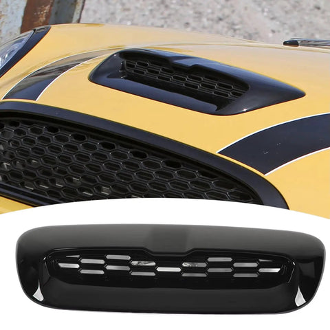 New Premium Direct Fit Rigid Plastic Honeycomb Hood Scoop For Tesla Cybertruck showing sleek design and black finish on yellow car.