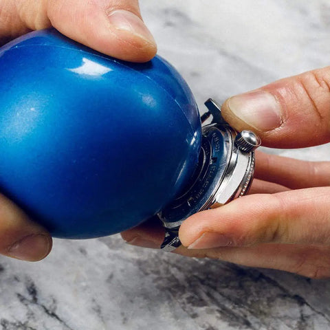 Air Filled Friction Ball Watch Case Opener With Ball Needle Quick Back Case Opening Tool For Unscrewing Watches in use.