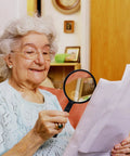Senior using Handheld 10X Reading Magnifier With 75mm Shatterproof Lens Non Slip Grip Ideal For Seniors And Close Work