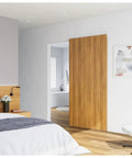 Installed Concealed Sliding Barn Door Hardware Kit With Soft Close For 42 Inch Track, door not included, showing invisible rail system.