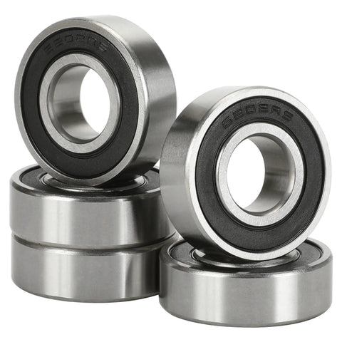Four 6202-RS minibike wheel bearings with metal outer race and black rubber seals