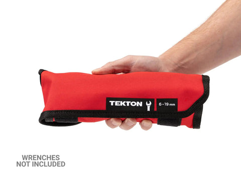 Hand holding red Durable Wrench Roll Pouch For 6 To 19 mm Combination Wrenches With Size Marked Pockets, Heavy Duty USA Made Tool Organizer