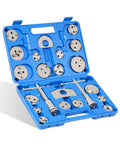 DAYUAN disc brake caliper piston rewind tool kit in blue case with circular metal plates and two guide rods.
