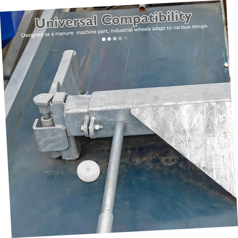 Dead Simple Setup Nylon Wheel Casters With Precision Ball Bearings and Heavy Duty Brackets For Manure Removal Systems and Industrial Tracks, close-up of caster assembly on steel track.