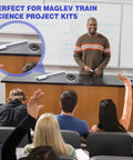 Hands On Magnetic Levitation Train Kit For STEM Learning demonstrated on a classroom desk near a teacher