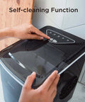 Silonn black countertop ice maker, front-angle view with lid open and control panel visible