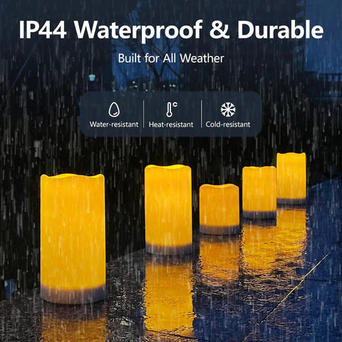 Solar Powered Pillar Candles Set Of 4 3.25 Inch By 6 Inch Waterproof LED Flameless Dusk To Dawn Outdoor Candles in rain.