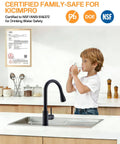 Slick Matte Black Kitchen Faucet With Pull Down Spray And Smooth Single Handle Control shown in kitchen with child drinking from glass.
