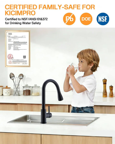 Slick Matte Black Kitchen Faucet With Pull Down Spray And Smooth Single Handle Control shown in kitchen with child drinking from glass.