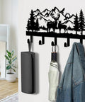 Deer Mountain Metal Key Holder Wall Mount For Rustic Cabin Decor, featuring woodland wildlife design with hooks, mounted on wall.