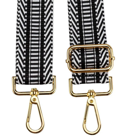 Upgrade Your Daily Carry With This Wide Adjustable Jacquard Crossbody Strap For Women Featuring Gold Hardware And A Bold Diagonal Weave Design That Truly Makes Your Favorite Handbags Look Fresh And Ready To Flex Anywhere You Go Today. Adjustable strap with gold clips and black and white diagonal weave.