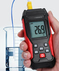 K Type Thermometer With Two Thermocouple Probes, Wide Range From -328F To 2501F, Backlit LCD Display, held near beaker