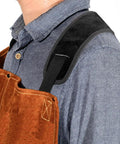 Close-up of Beefy Heavy Duty Welding Apron With Gloves For Men, showing shoulder strap detail on heat and flame-resistant leather.