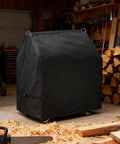 Heavy Duty 600D Bandsaw Cover For Deluxe Horizontal And Vertical Tabletop Saws All Weather Dustproof Protection Heavy Duty Construction Fits 47.3 Inches Long 30 Inches Wide 50 Inches High, covering a bandsaw in a workshop with wood shavings