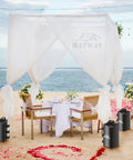 Heavy Duty Canopy Water Weights 88 Lbs Set Of 4 Will Not Blow Away 4 Water Bags securing white gazebo on beach