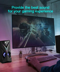 10W RGB PC Speakers with Volume Control and LED Lighting next to a monitor, enhancing gaming and audio experience at a desk setup.