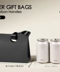 Mini Gift Bags With Ribbon Handles Set Of 10 Assorted Colors For Party Favors And Gift Wrapping, black bag next to cans.