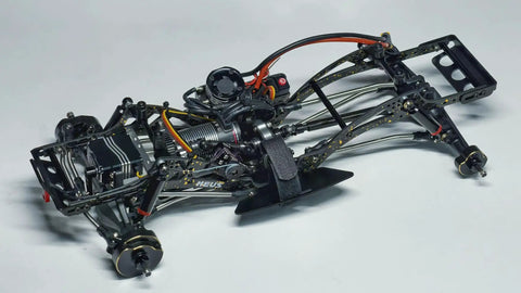 Gold Rush V2 Carbon Fiber LCG Chassis Kit For Axial SCX10 II Capra 1.9 UTB And Other DIY One Tenth RC Crawlers, side view.