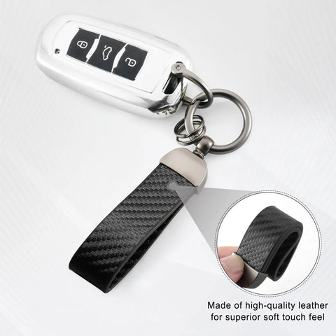 Premium Leather And Slick Carbon Fiber Keychain Featuring An Anti Lost D Ring With Two Extra Key Loops Made From Tough Zinc Alloy Hardware For Secure Daily Carry Or Glove Box Setup In Classic Black showing key fob.