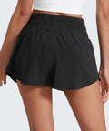 Back view of Ruffle Skirt Overlay Workout Shorts For Women With High Rise Waist Built In Mesh Liner Quick Dry Soft Fabric 1.5 Inch Inseam