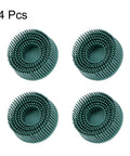 Front view of four green 2-inch bristle discs, 50 grit abrasive brushes for metal deburring.