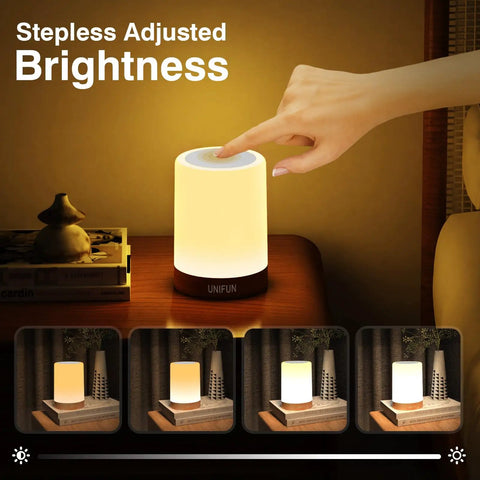 Person adjusting Touch Control Dimmable Bedside Table Lamp with RGB Color Changing and Warm White Light at nightstand.