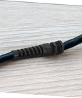 Close-up of a cable with Ten Pack Adjustable Cable Connectors Kit Nylon Cable Gland Strain Relief Joints for rugged installations.