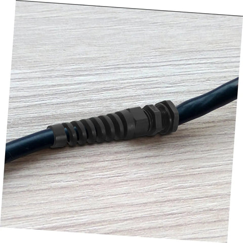 Close-up of a cable with Ten Pack Adjustable Cable Connectors Kit Nylon Cable Gland Strain Relief Joints for rugged installations.
